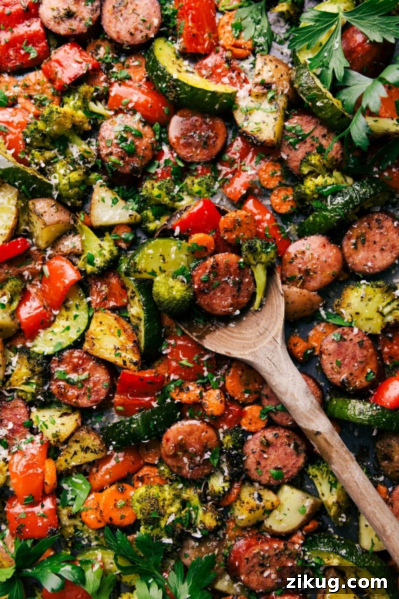 A tray featuring the perfectly cooked and seasoned one pan Italian sausage and veggies recipe, where all the flavors come together to create the perfect combination of flavor and texture.