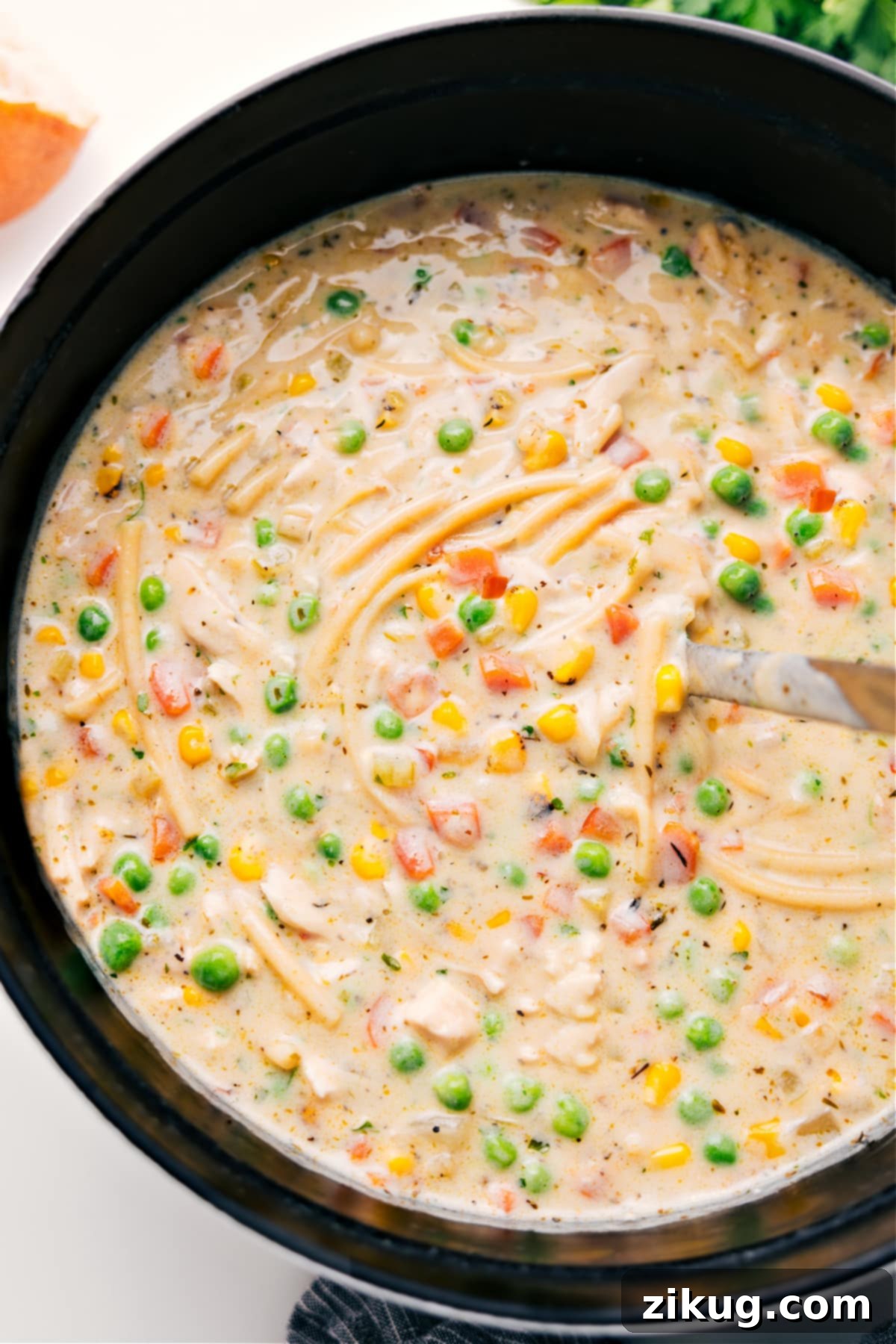 One Pot Creamy Chicken Noodle Soup Recipe The finished, rich creamy chicken noodle soup simmering in a large, inviting pot, ready to be served and enjoyed by the family.