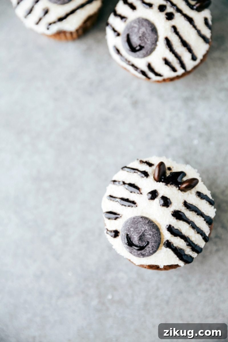 Adorable Animal Cupcakes Made Simple 2 EASY JUNGLE CUPCAKES! Four simple and easy to make animal jungle cupcakes -- a zebra, monkey, tiger, and a panda. via chelseasmessyapron.com