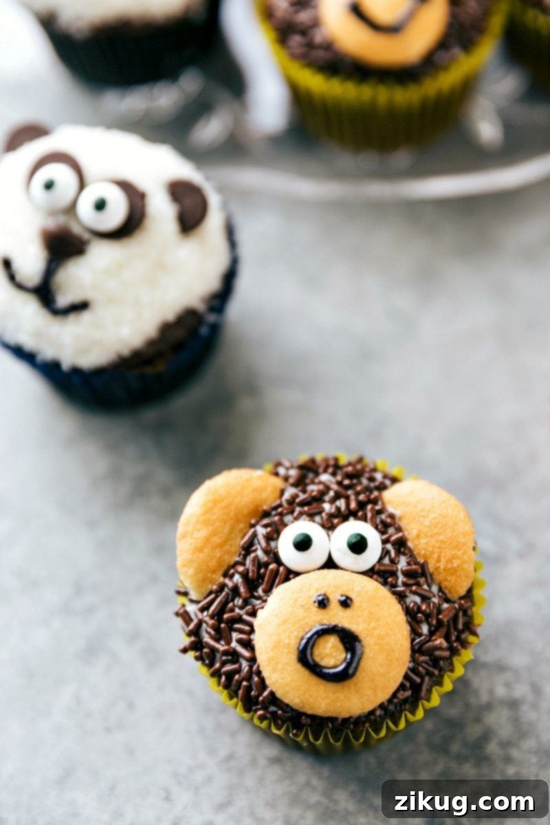 Adorable Animal Cupcakes Made Simple 4 EASY JUNGLE CUPCAKES! Four simple and easy to make animal jungle cupcakes -- a zebra, monkey, tiger, and a panda. via chelseasmessyapron.com