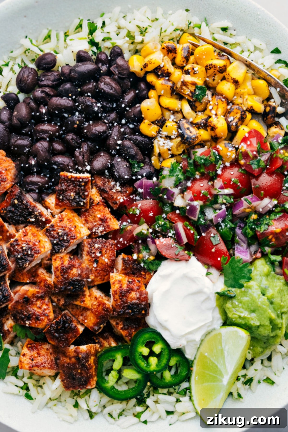 Our Favorite Chicken Burrito Bowls Recipe Fully loaded Chicken Burrito Bowls with all the delicious toppings.
