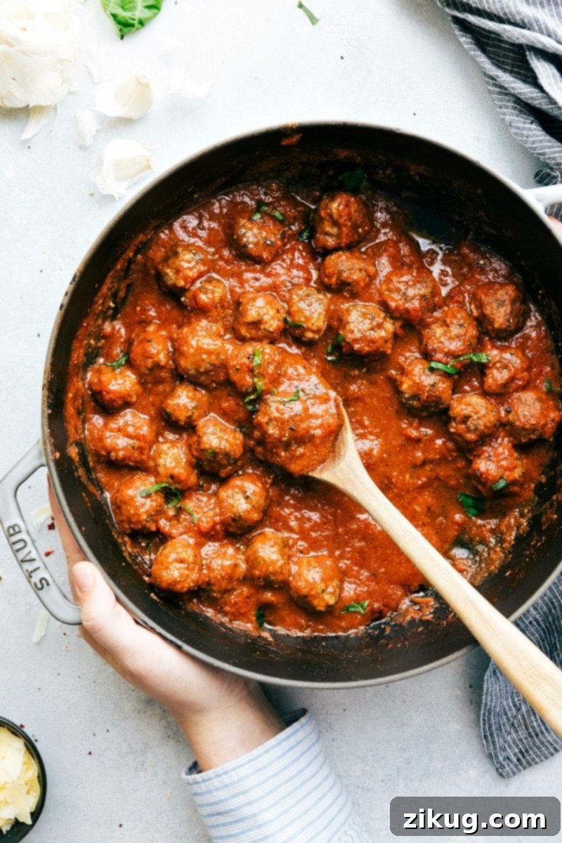 Molten Core Meatballs 4 The BEST EVER cheese stuffed meatballs! Mozzarella filled and served in the most delicious homemade marinara sauce over pasta.