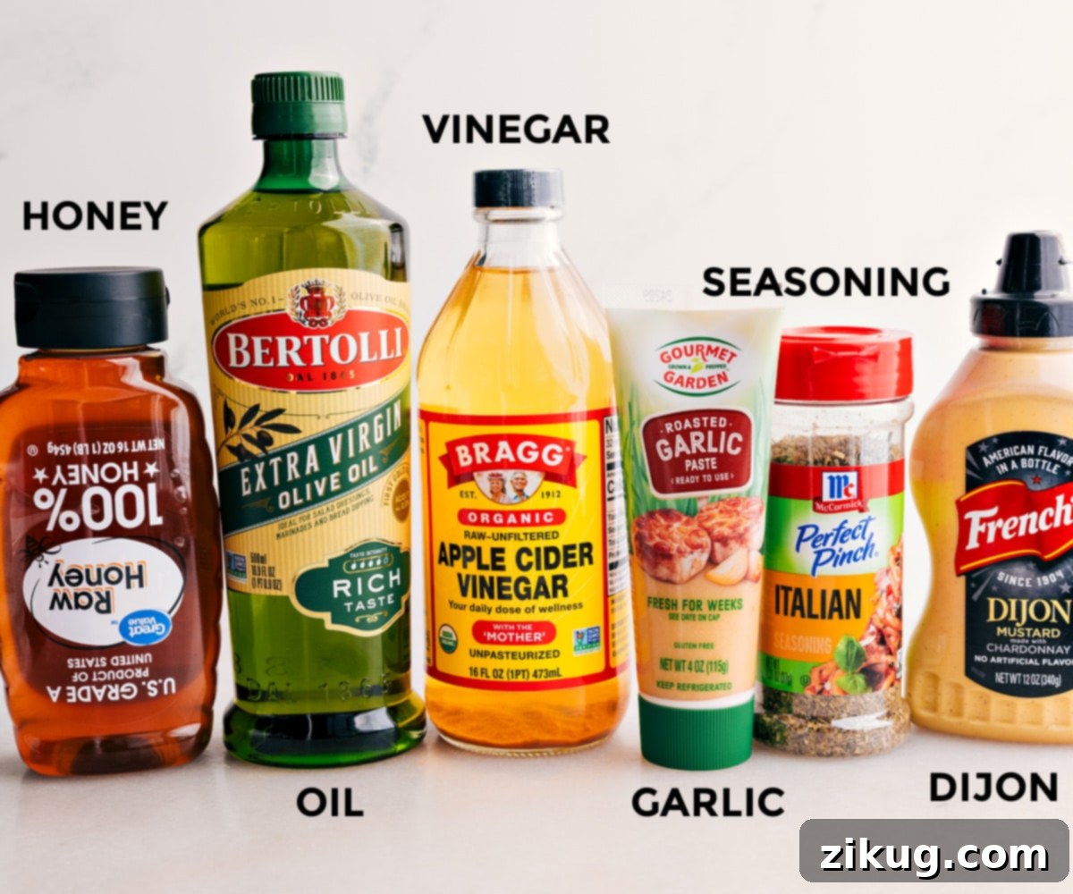Crafting the Perfect Dressing for Marry Me Chicken Pasta Salad Ingredients for the best dressing: Dijon mustard, Italian seasoning, minced garlic, apple cider vinegar, olive oil, and honey, neatly arranged for mixing.