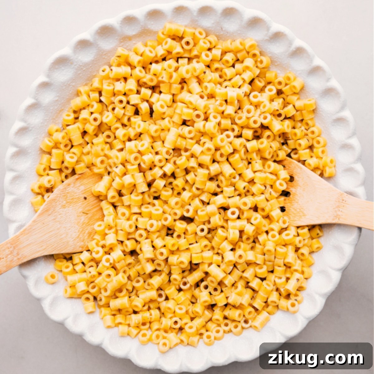 How To Make Italian Grinder Pasta Salad Freshly cooked ditalini pasta resting in a large bowl, perfectly al dente and ready to be combined with the flavorful dressing and other Italian Grinder ingredients.
