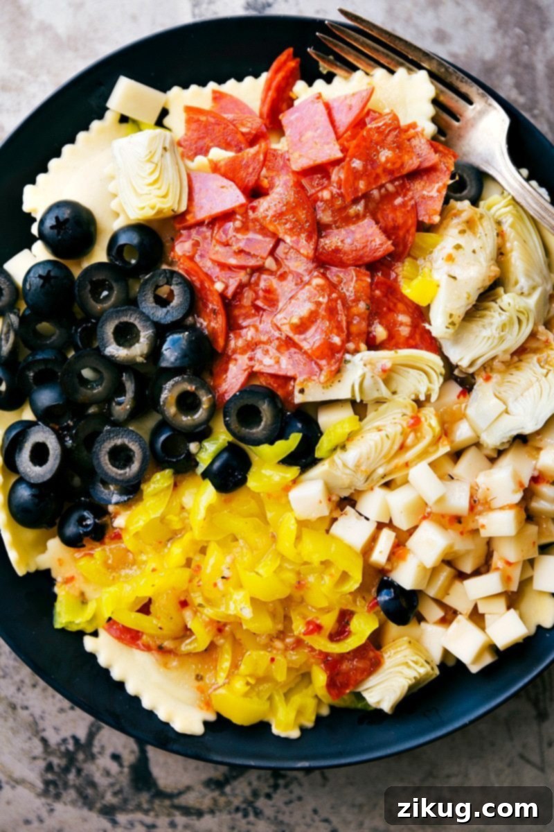 Vibrant Ravioli Salad 3 Close-up of freshly cooked four-cheese ravioli, perfectly al dente, ready for the salad