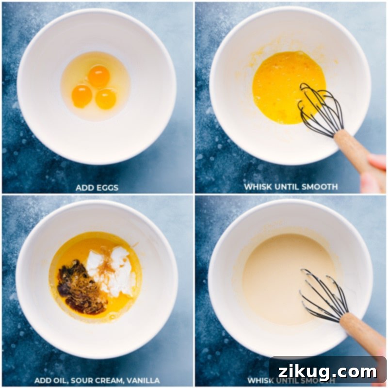 Blending the Wet Ingredients for Ultimate Moisture and Flavor Wet ingredients including eggs, sour cream, oil, and vanilla extract being whisked together in a bowl, forming the liquid base for the cake mix cupcakes.