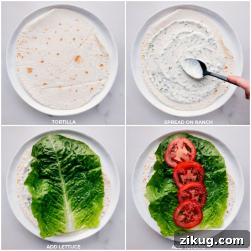 Layering ranch dressing, crisp lettuce, and fresh tomato slices onto a tortilla for a turkey wrap