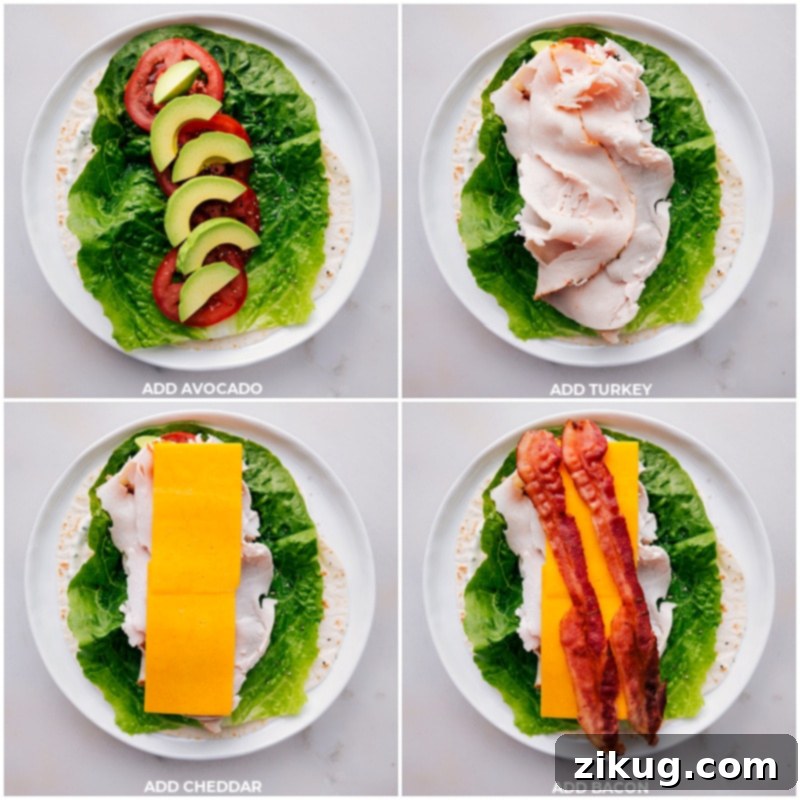 Layering avocado, turkey, and cheddar cheese on a tortilla for a wrap