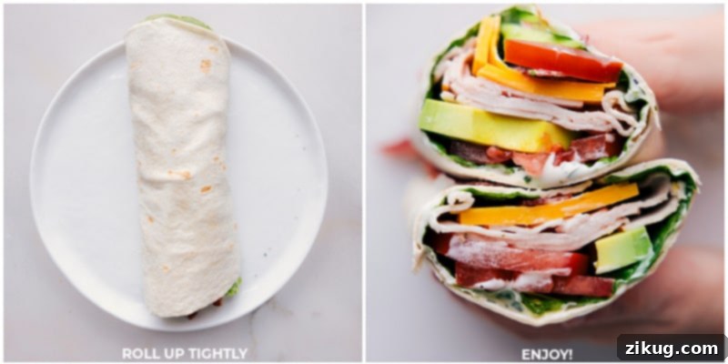 Rolled turkey avocado wrap being cut in half, revealing layers