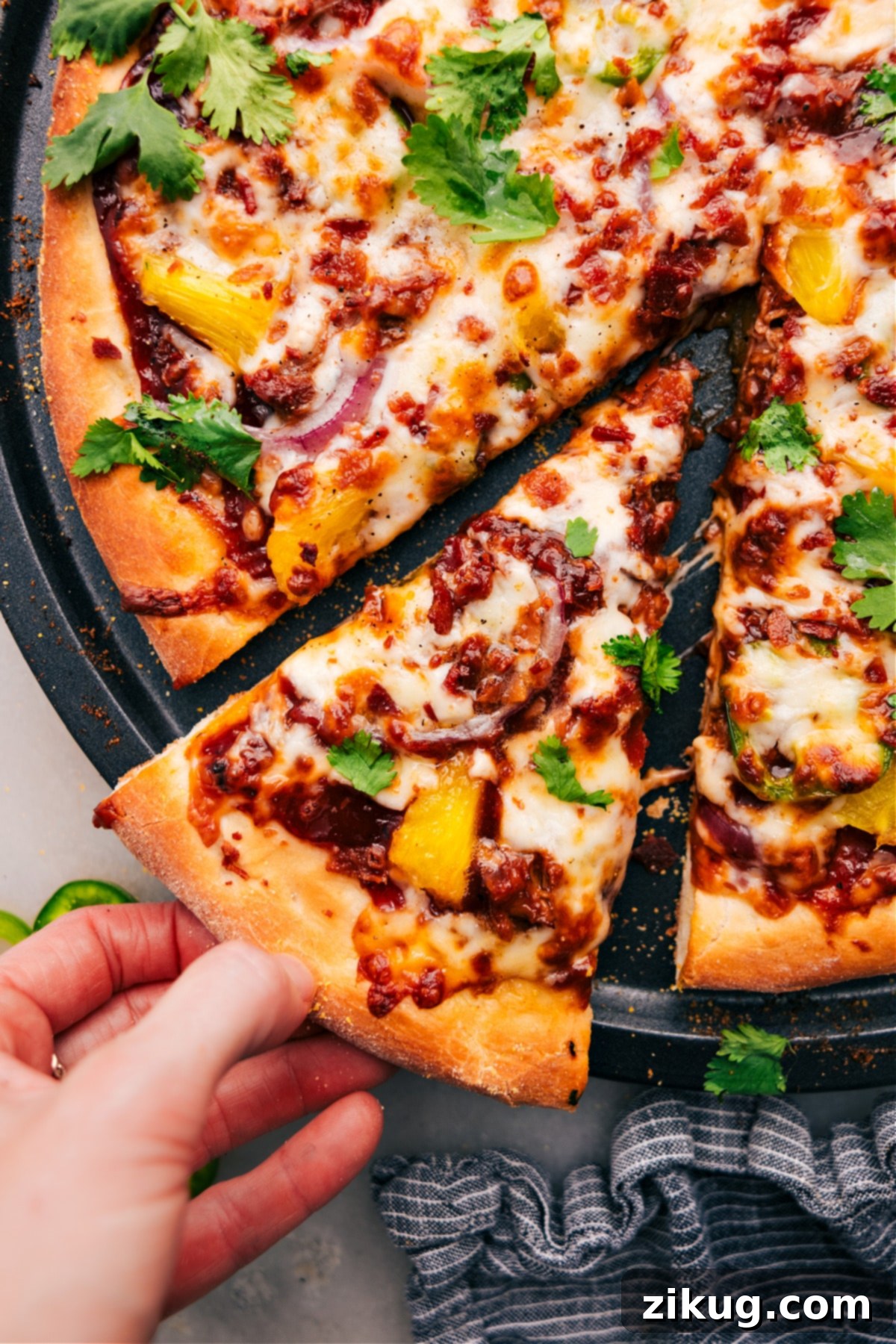 A mouthwatering BBQ chicken pizza, fresh out of the oven, with a perfectly cut slice being lifted, revealing the gooey melted cheese and abundant toppings, ready to be devoured with delight.