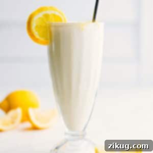 A refreshing glass of homemade frozen lemonade.