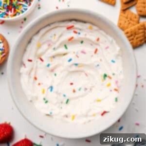 A bowl of homemade fluffy yogurt, smooth and creamy, ready to be served as a high-protein snack or dessert.