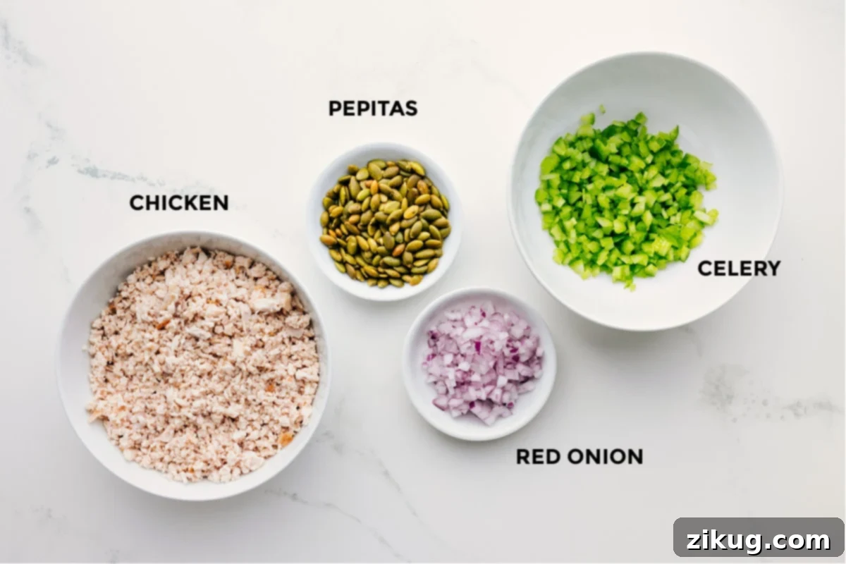 Ingredients In Green Goddess Chicken Salad Chicken, pepitas, celery, and red onion all prepped and ready to go.