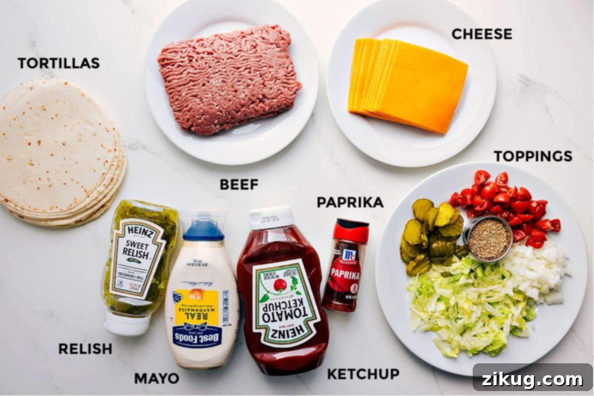 Essential Ingredients for Smash Burger Tacos All the ingredients are prepped and ready for easy assembly. That includes the tortillas, beef, cheese, relish, mayo, ketchup, paprika, and toppings.