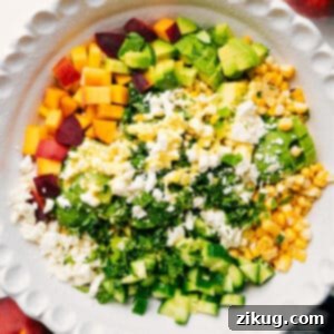 Final plated Peach Feta Salad with a vibrant mix of colors and textures