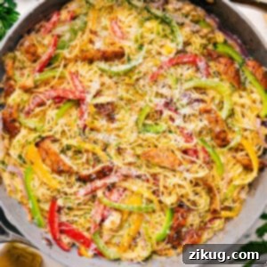Homemade Chicken Scampi dish featuring crispy chicken, pasta, and lemon cream sauce.