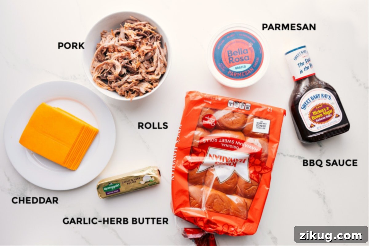 Essential Ingredients for Crafting BBQ Pulled Pork Sliders All the essential ingredients neatly prepped for BBQ Pulled Pork Sliders: shredded BBQ pork, Hawaiian sweet rolls, cheddar cheese slices, a small bowl of melted garlic-herb butter, and a bottle of BBQ sauce.