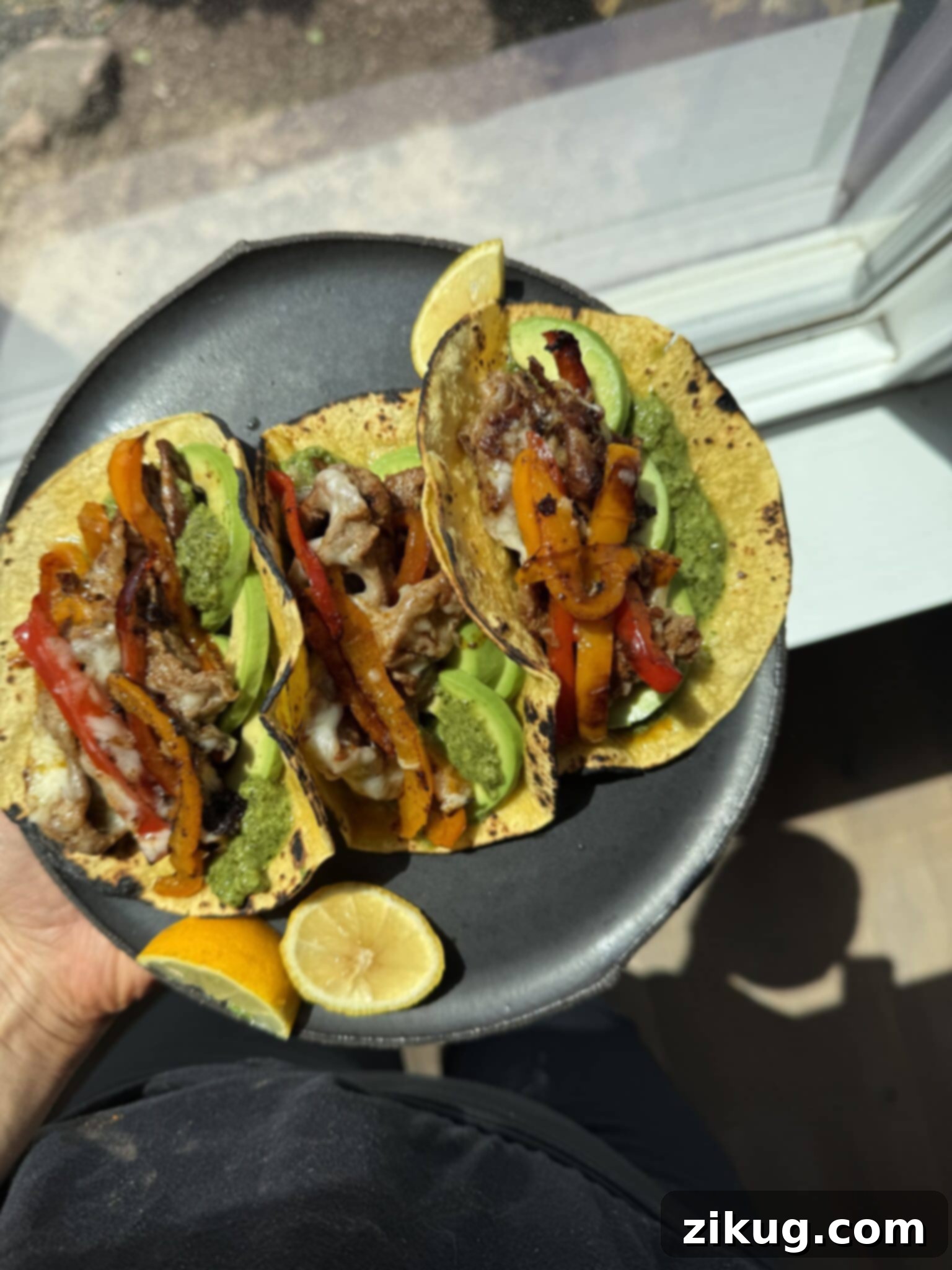 Shaved beef tacos on a plate ready to be enjoyed, featuring Trader Joe's ingredients.
