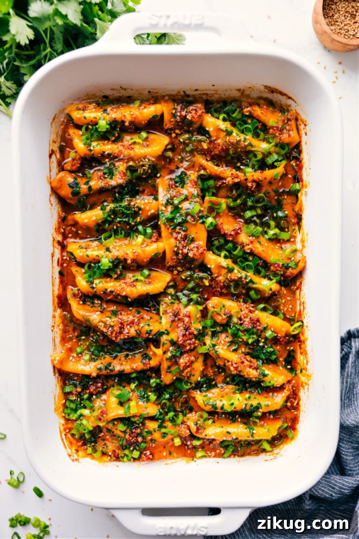 One-pan dumpling dinner recipe with Trader Joe's chicken potstickers and chili onion crunch.