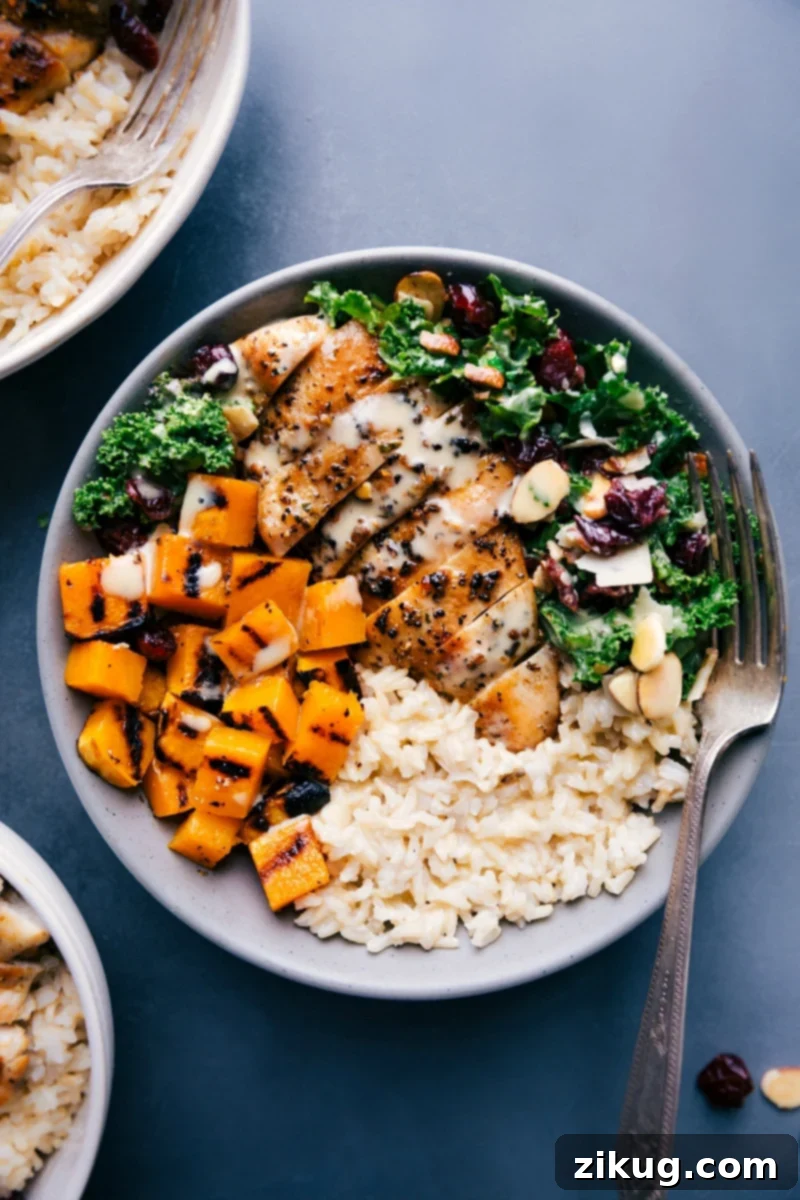 Trader Joe's Harvest Bowls with roasted butternut squash, kale salad, wild rice, and chicken.