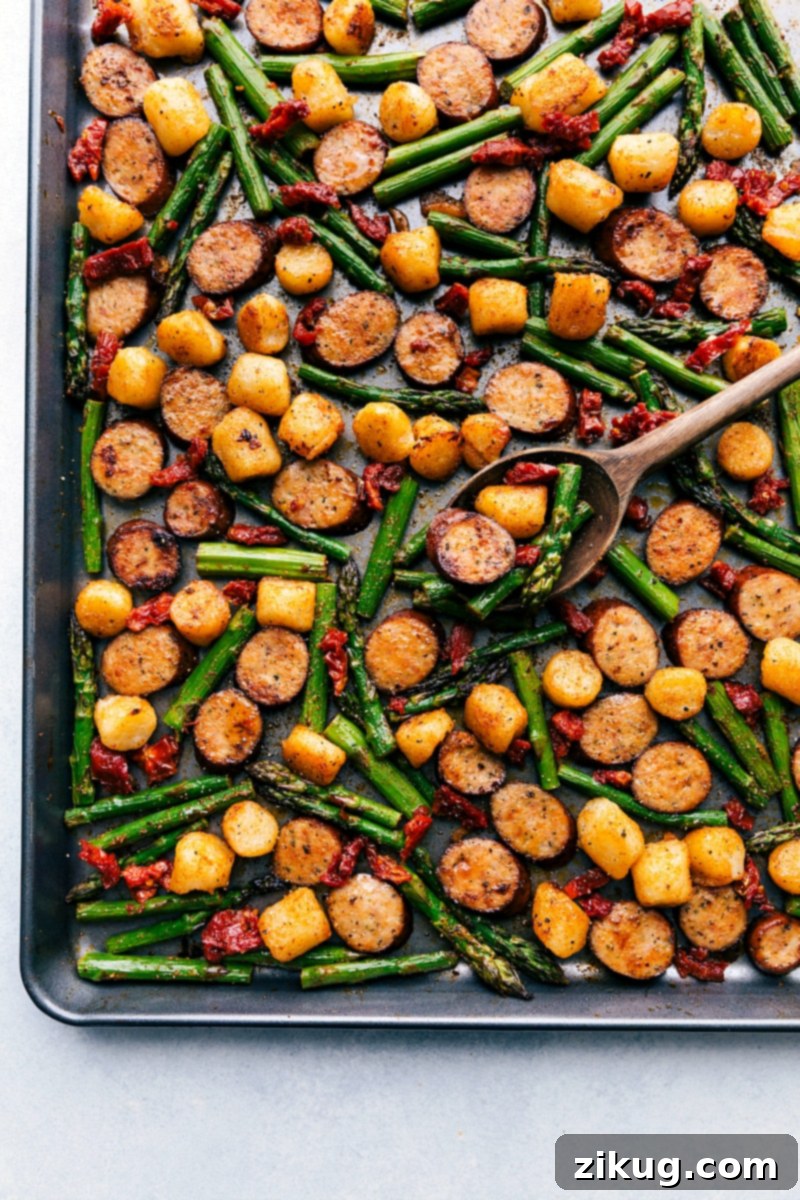 Sausage pesto gnocchi sheet pan dinner ready to serve, made with Trader Joe's favorites.