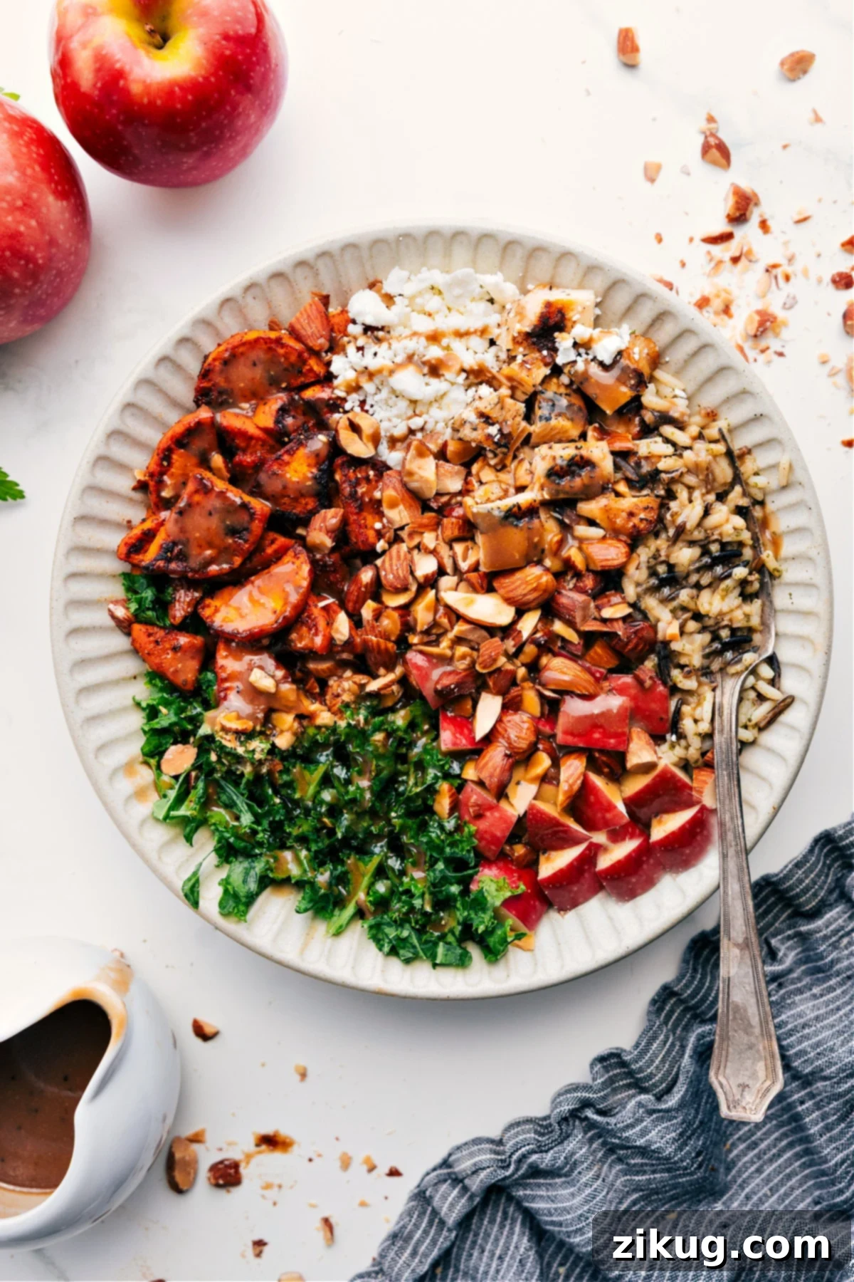 High Protein Chicken Sweet Potato Recipe A vibrant Chicken Sweet Potato Harvest Bowl, beautifully plated with a generous drizzle of balsamic dressing, ready to be savored.