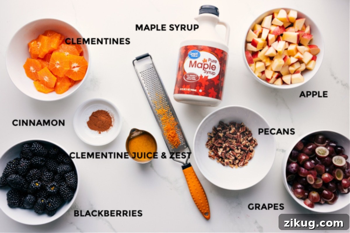 Ingredients In Fall Fruit Salad All the fresh ingredients for Fall Fruit Salad meticulously prepped for easy assembly, including brightly colored clementines, plump blackberries, juicy grapes, crisp apples, crunchy pecans, aromatic cinnamon, fresh orange juice and zest, and rich maple syrup.