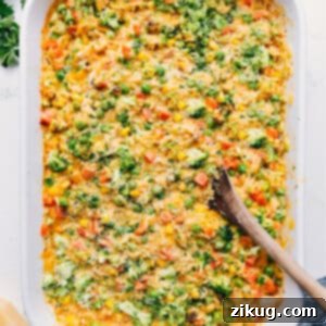 A close-up of the delicious Chicken Orzo Bake in a serving dish.