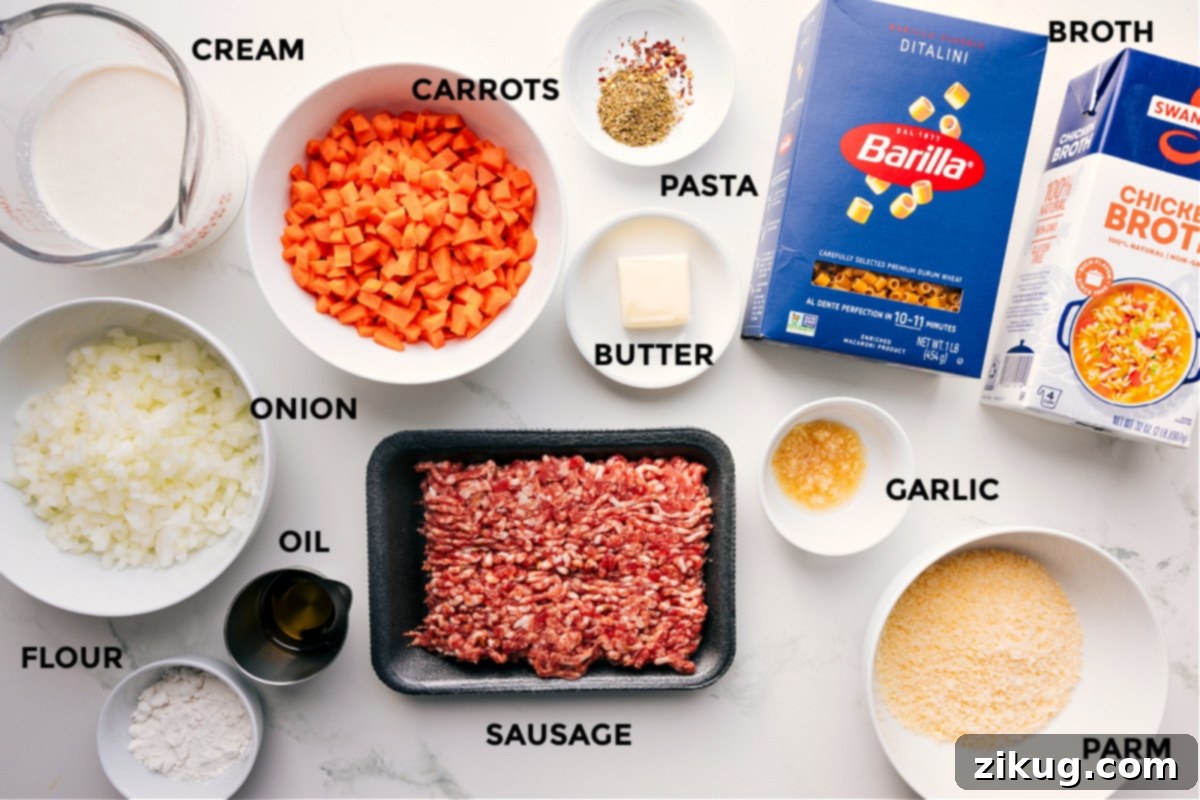 Key Ingredients for Delicious Creamy Parmesan Italian Sausage Soup All essential ingredients for Creamy Parmesan Italian Sausage Soup, including fresh heavy cream, various finely chopped vegetables like carrots and onions, flour, olive oil, uncooked Italian sausage, ditalini pasta, unsalted butter, minced garlic, high-quality grated Parmesan cheese, and rich chicken broth, meticulously prepped and ready for cooking on a wooden board.