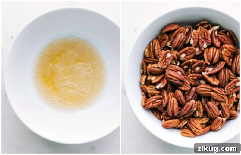 How To Make Candied Pecans Recipe A close-up shot of egg whites being whipped until frothy in a glass bowl, next to a bowl of fresh pecan halves, demonstrating the initial steps of the candied pecan recipe.