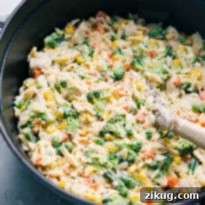 One-Pot Creamy Orzo, packed with chicken and vegetables in a rich Parmesan sauce.