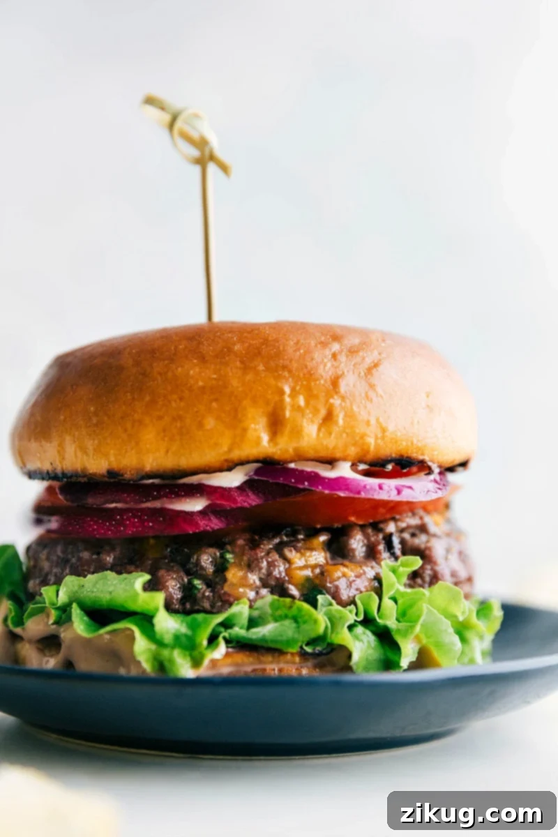 Delicious Burger with Juicy Patty and Toppings A mouthwatering burger created from this burger recipe, featuring a juicy patty sandwiched between soft buns, topped with a variety of delicious toppings.
