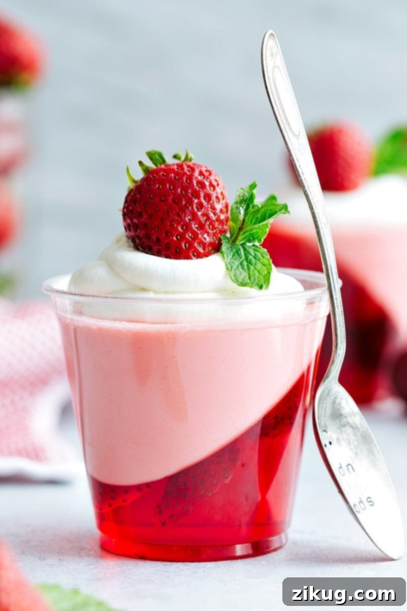 This simple yet brilliant hack creates elegant slanted strawberry jell-o parfait cups, complete with a creamy strawberry mousse layer. Delicious and perfect for any occasion!