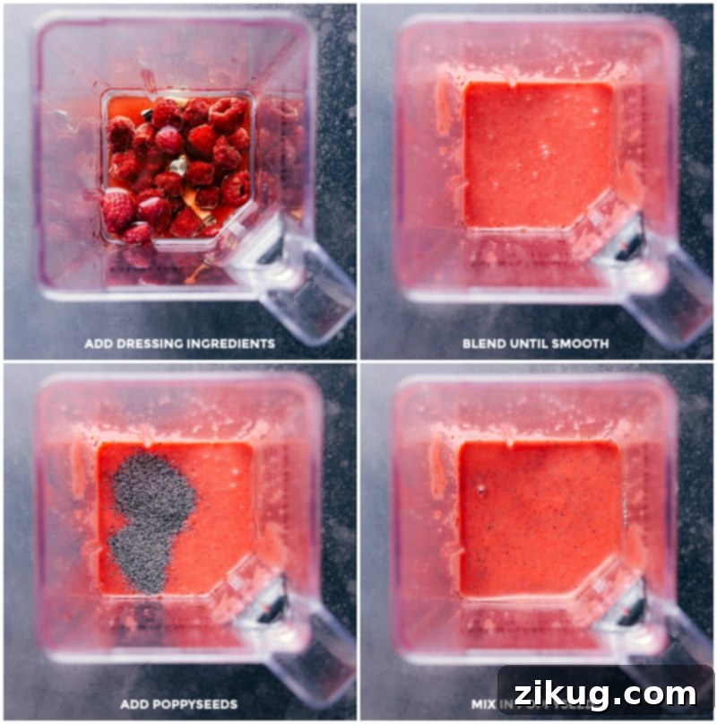 Homemade raspberry vinaigrette dressing being smoothly blended in a food processor, highlighting the vibrant color and creamy texture.
