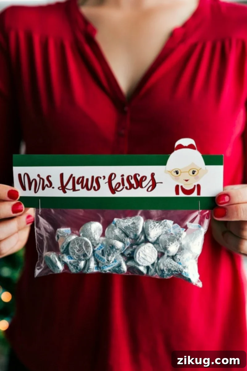 The most festive Christmas gifts! These candies/treats are put in a snack-size plastic bag and you can staple on the FREE printable bag toppers! Recipe via chelseasmessyapron #festive #holidays #simple #quick #treats #snacks #reindeer #mrsclaus #easy #christmas #gifts Image of the Mrs. Klaus' Kisses Christmas gift