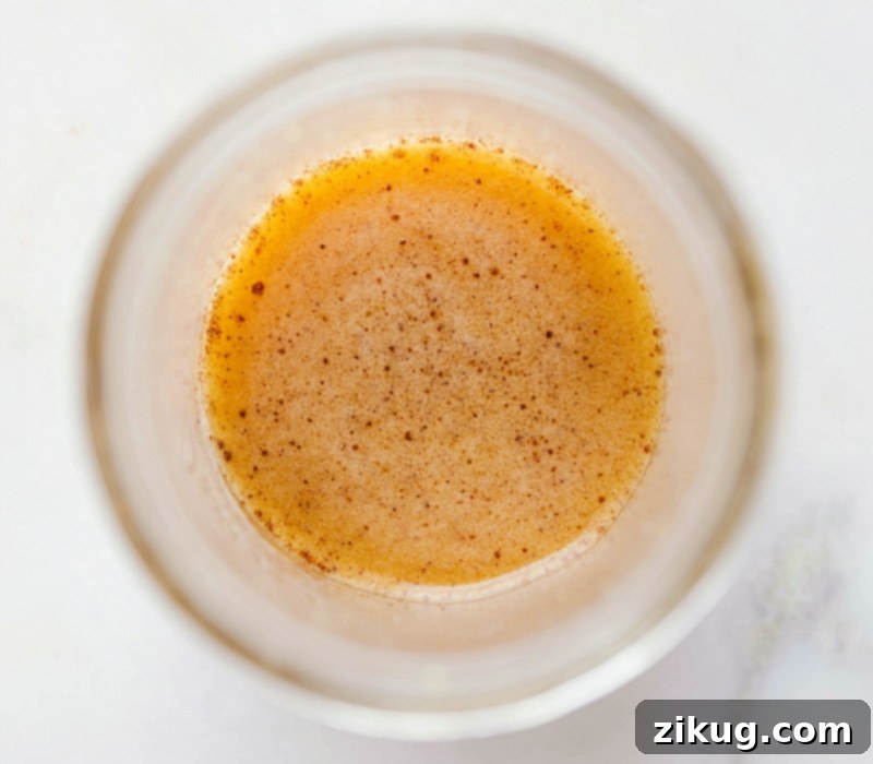 Crisp Apple Salad 3 Apple cider vinaigrette dressing in a mason jar, a delightful addition to your salad.