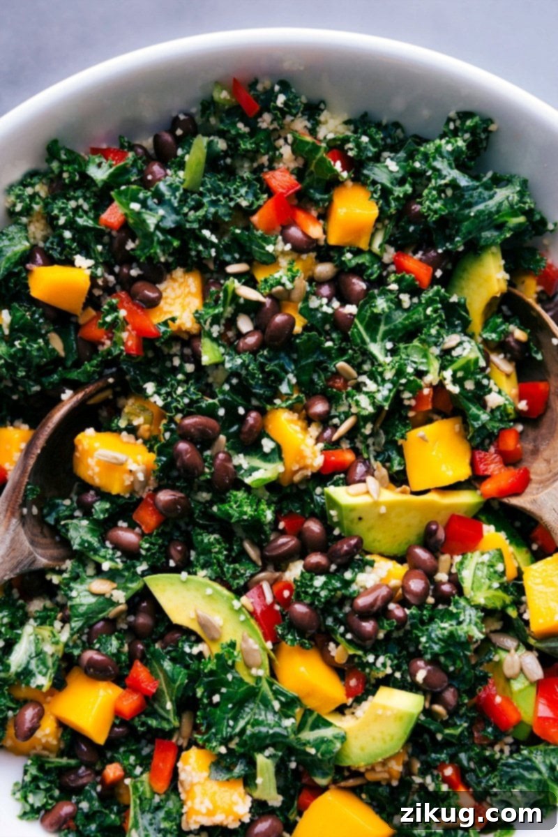 Ready-to-eat kale couscous salad, freshly dressed and garnished.