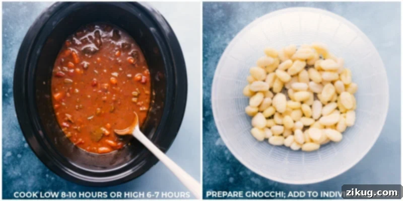 Crockpot Beef Stew With Gnocchi Tender gnocchi being gently stirred into a rich bowl of Crockpot Beef Stew, adding a delicious, pillowy twist to the classic dish.