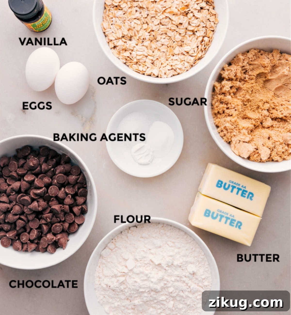 Key Ingredients for Brown Butter Oatmeal Chocolate Chip Cookies All the essential ingredients for making these Brown Butter Oatmeal Chocolate Chip Cookies, including flour, chocolate, butter, sugars, oats, vanilla, eggs, and leavening agents, perfectly prepped for easy baking.