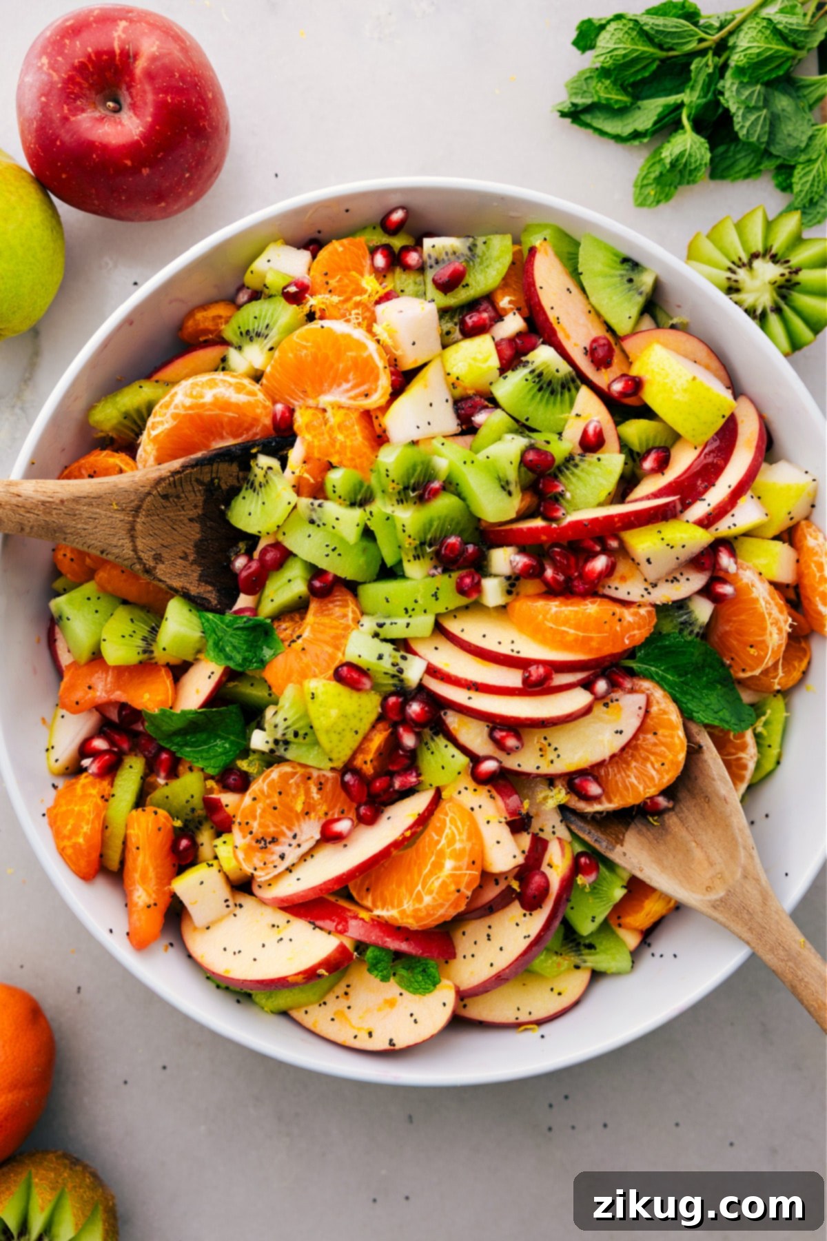 The Best And Easiest Winter Fruit Salad A bowl of fresh and delicious winter fruit salad, beautifully arranged and ready to be served.