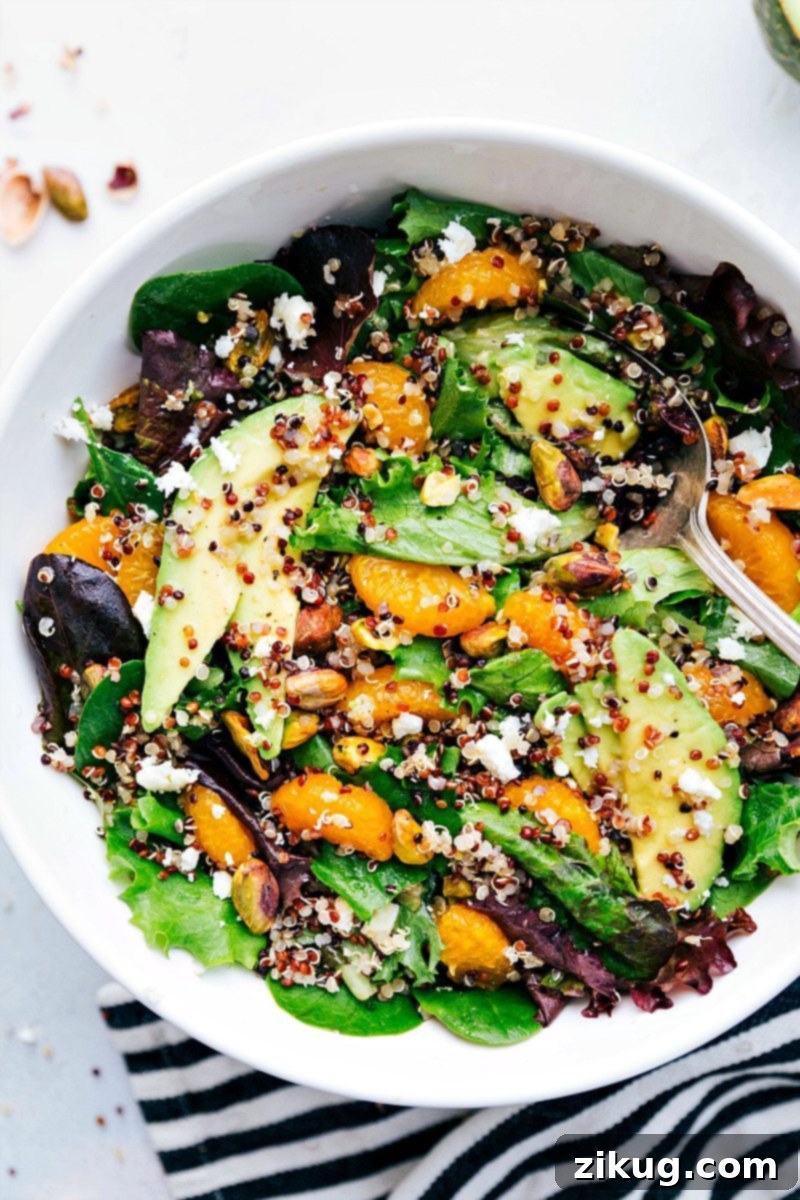 Close-up overhead image of the finished Citrus Quinoa Salad, perfectly mixed and ready to be served, highlighting its fresh and inviting appearance.