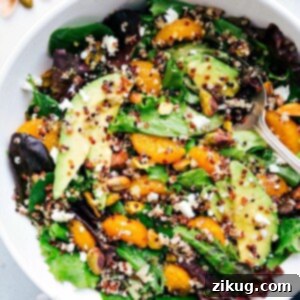 A bowl of vibrant Citrus Quinoa Salad with fresh ingredients.
