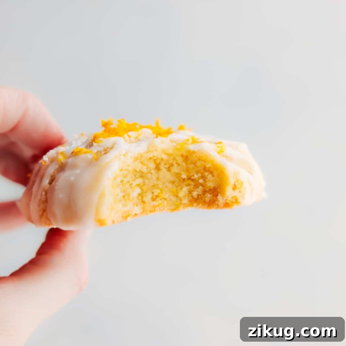 Glazed lemon cookies arranged on a platter
