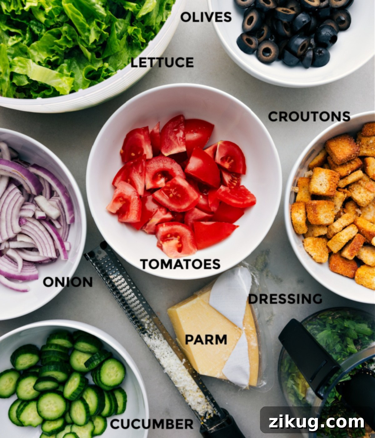 Vibrant Italian Salad 2 All the vibrant, fresh ingredients for the Italian Salad recipe meticulously prepped and arranged on a cutting board, showcasing their readiness for easy assembly.