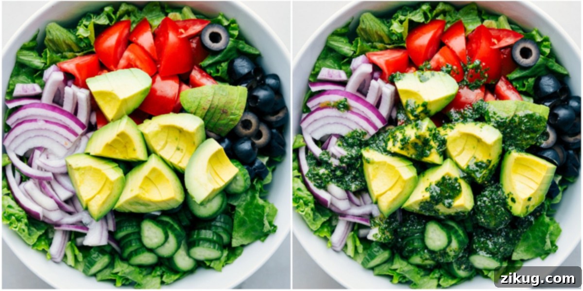Making This Italian Salad Recipe with Fresh Vegetables A large glass bowl filled with colorful, chopped Italian salad ingredients, with a stream of homemade dressing being poured over everything, ready for tossing.