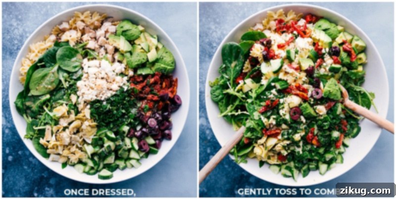 The Mediterranean Pasta Salad being gently mixed with the dressing, highlighting its vibrant colors and textures.