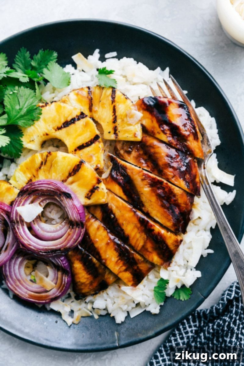 Teriyaki Chicken Over Coconut Rice Plate of Teriyaki chicken over coconut lime rice, garnished with fresh cilantro.