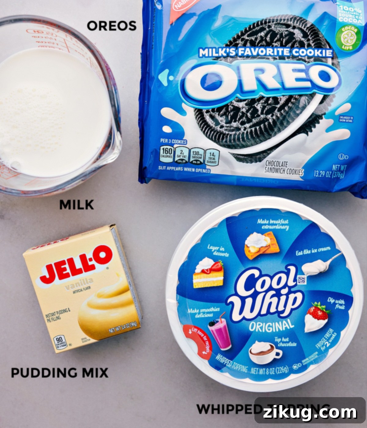 All the essential ingredients for making Oreo Fluff laid out on a counter, prepped for easy assembly.