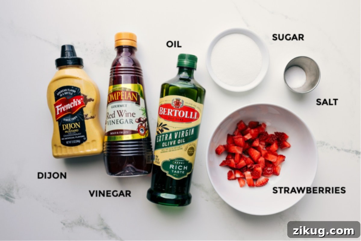 All the essential ingredients for a delicious Strawberry Vinaigrette meticulously prepped and arranged, including a vibrant pile of fresh strawberries, water, balsamic vinegar, minced shallot, Dijon mustard, honey, salt, pepper, and a bottle of olive oil, ready for blending.
