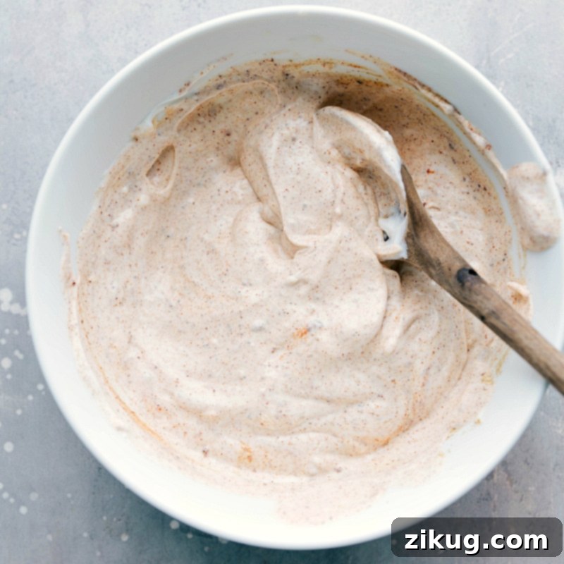 The finished sauce in a bowl, full of rich flavors, ready to enhance the dish.
